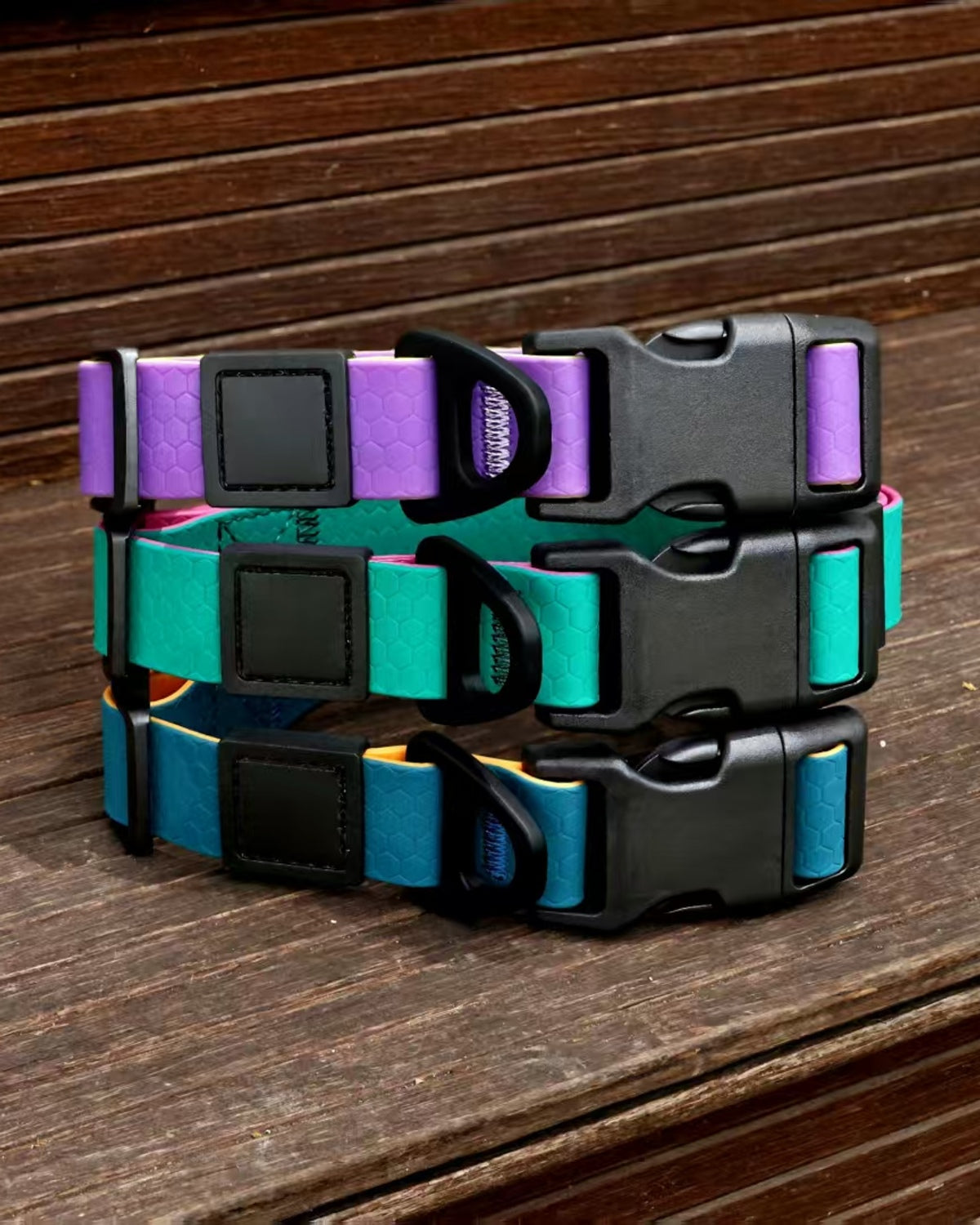 BD Warp™ Waterproof Honeycomb Collars - All Three Colorways on Natural Wood Deck
